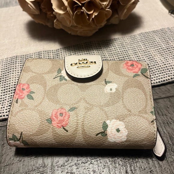 Coach Handbags - NWT Coach floral wallet